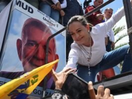 Venezuelan opposition leader emerges from hiding at rally amid crackdown
